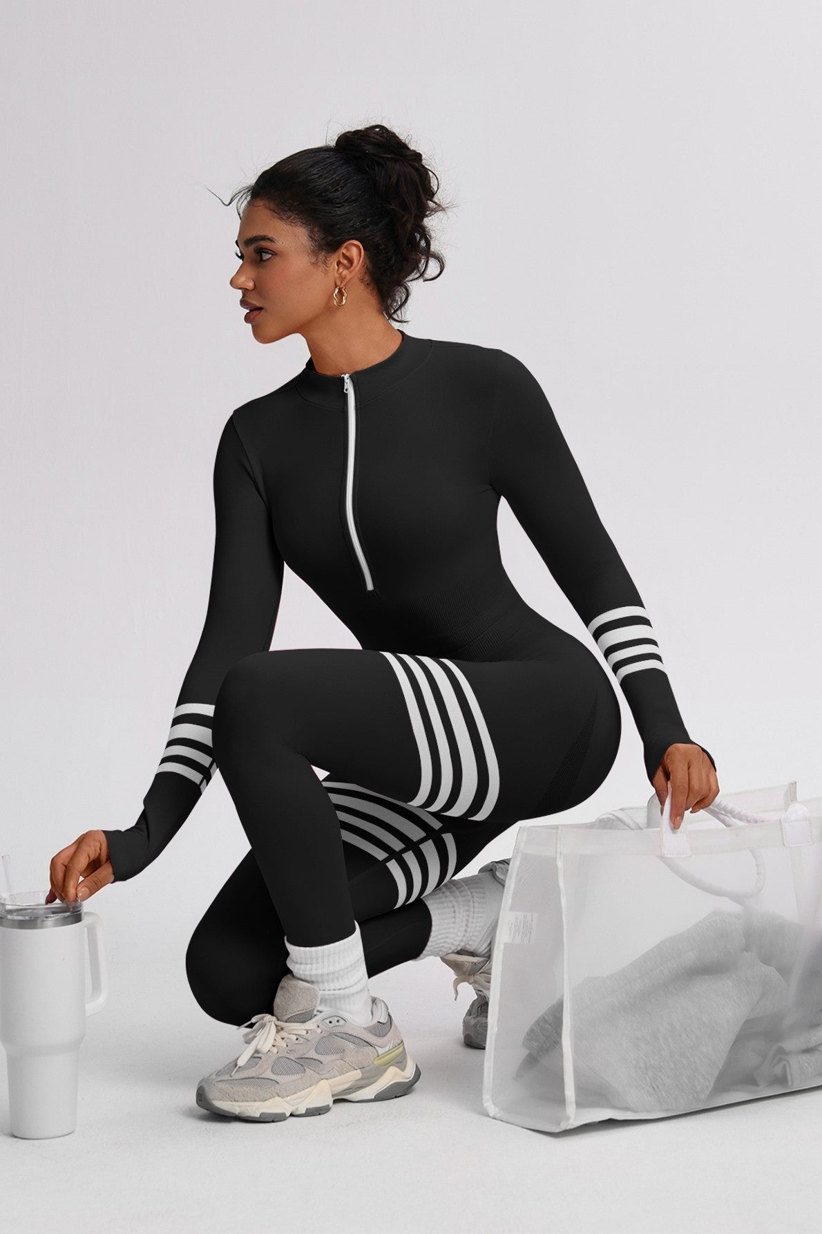 ZOE ZIPPER FRONT ATHLEISURE JUMPSUIT IN BLACK