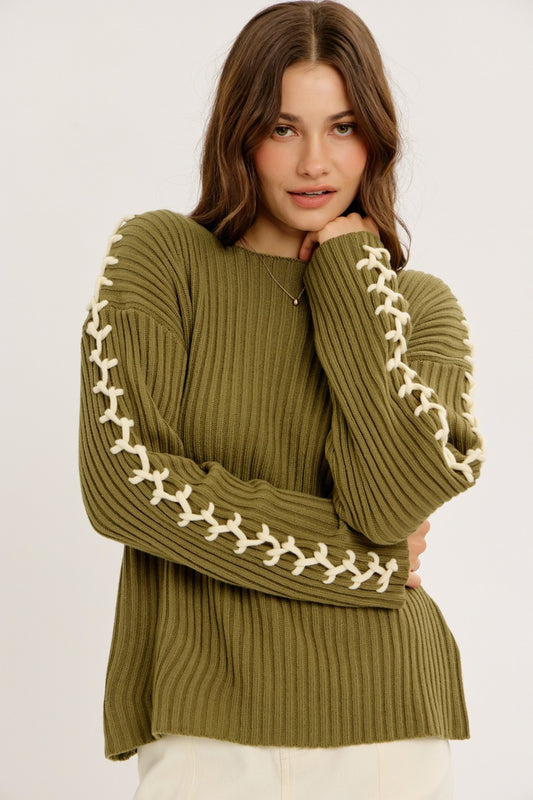 A STITCH IN TIME KNIT SWEATER