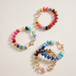Pulsera elástica de cuentas ovaladas de resina marmoleada con efecto degradado