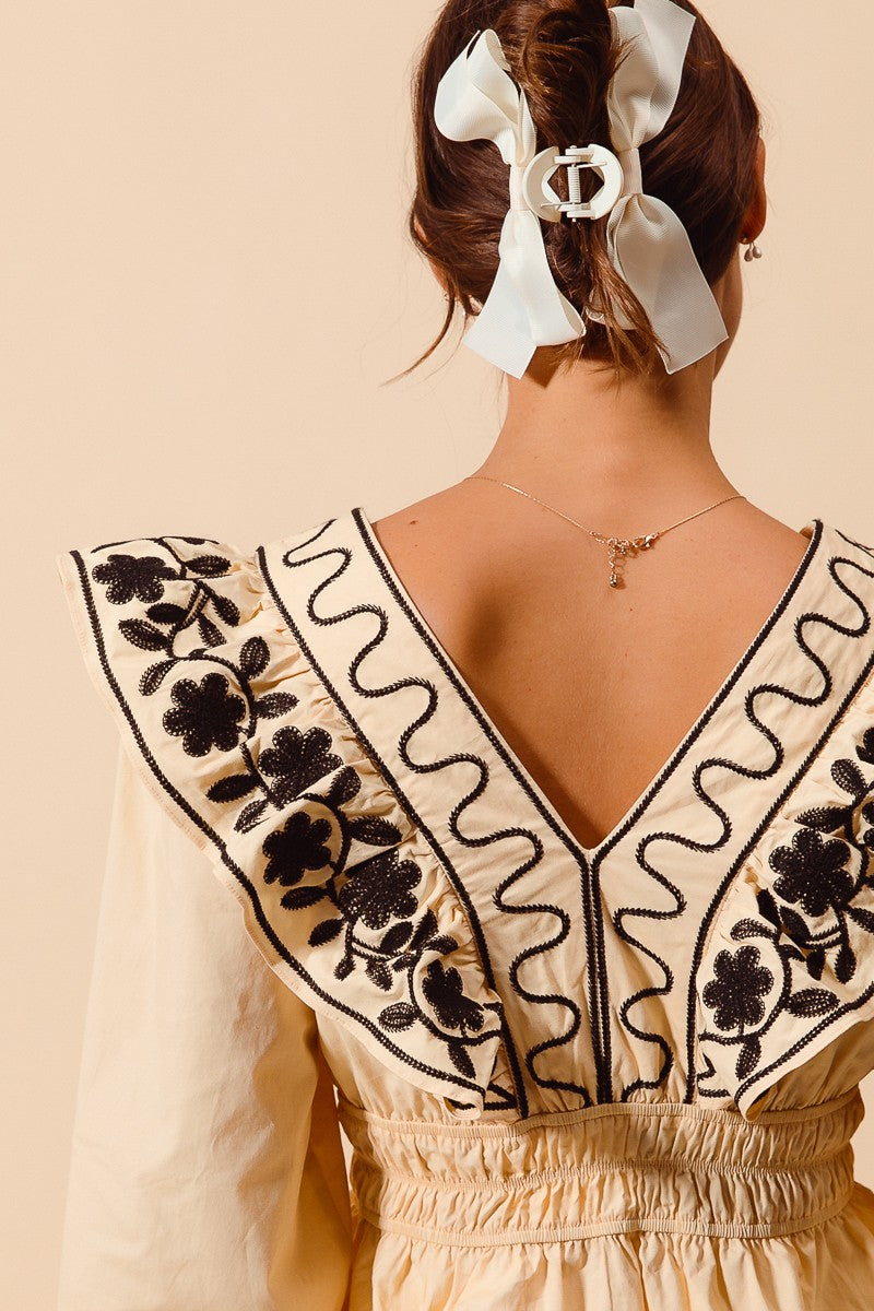 Allegra Floral Embroidered Neckline Peplum Top