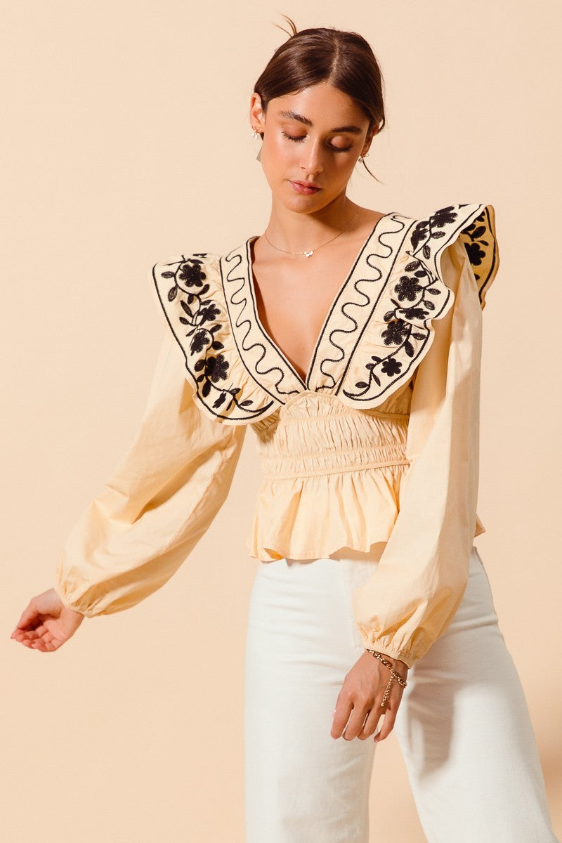 Allegra Floral Embroidered Neckline Peplum Top