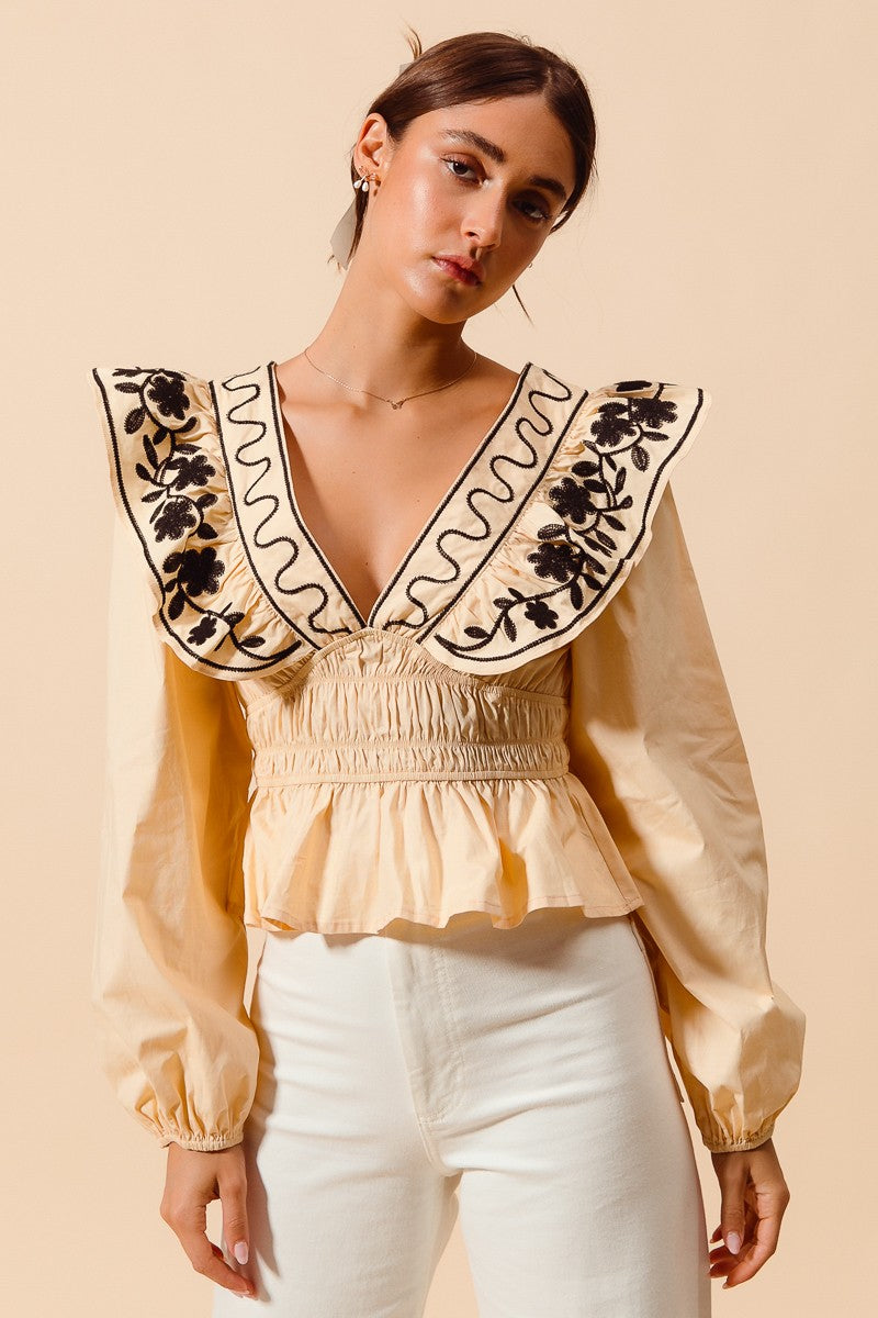 Allegra Floral Embroidered Neckline Peplum Top