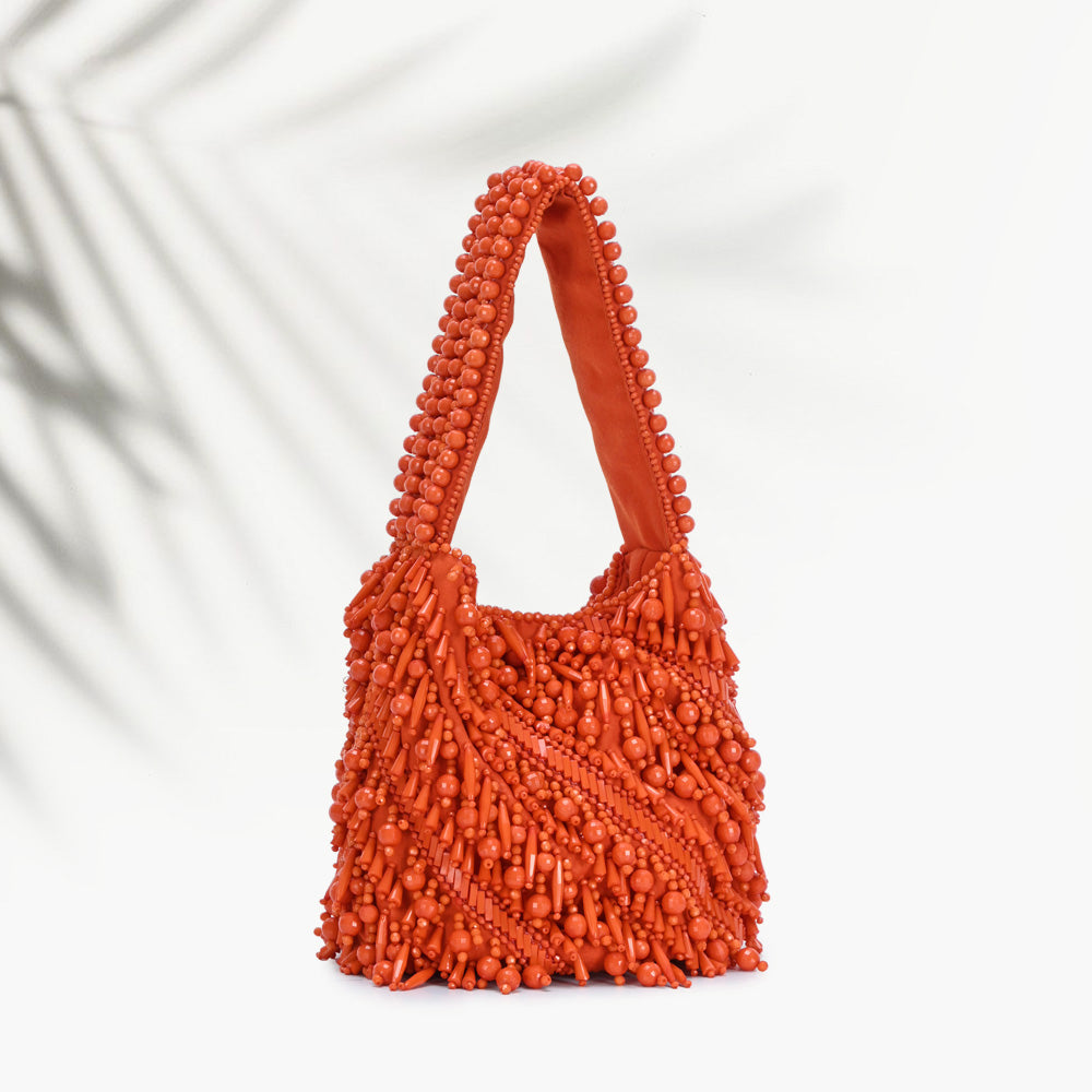 The Averlee Artisan Beaded Mini Bucket Bag in Orange
