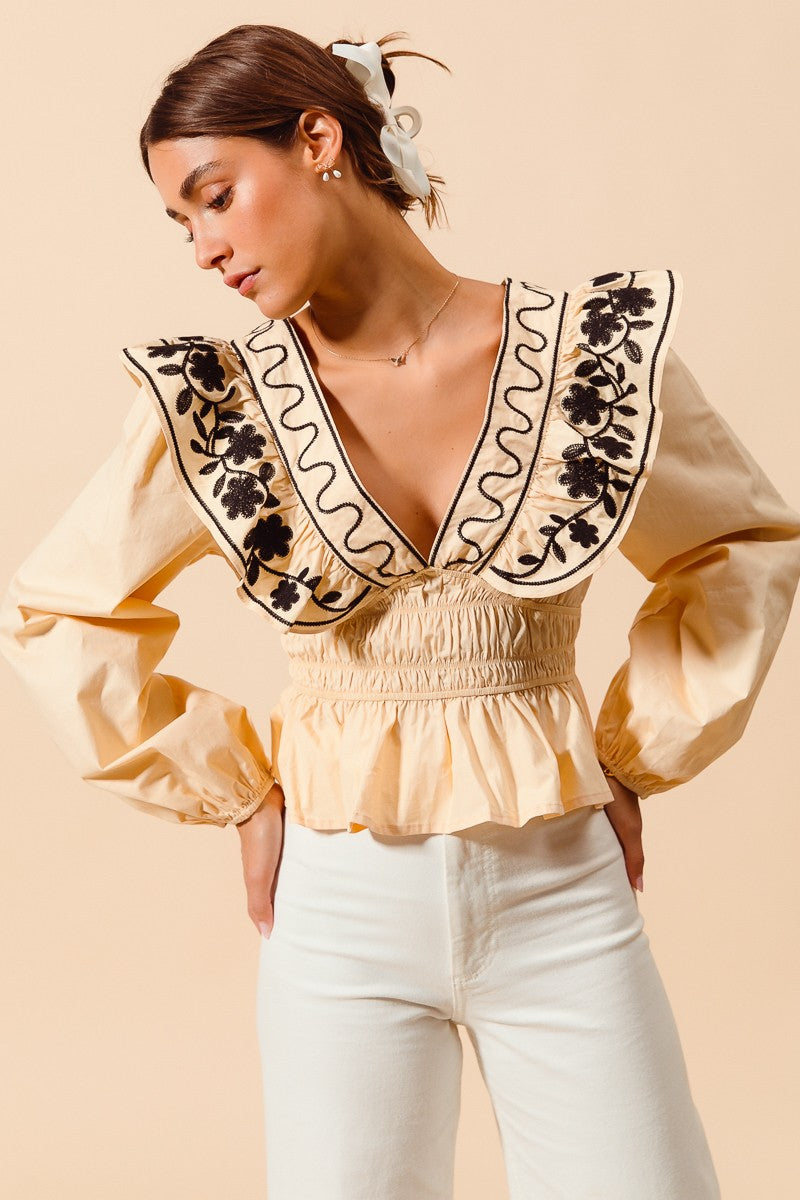 Allegra Floral Embroidered Neckline Peplum Top