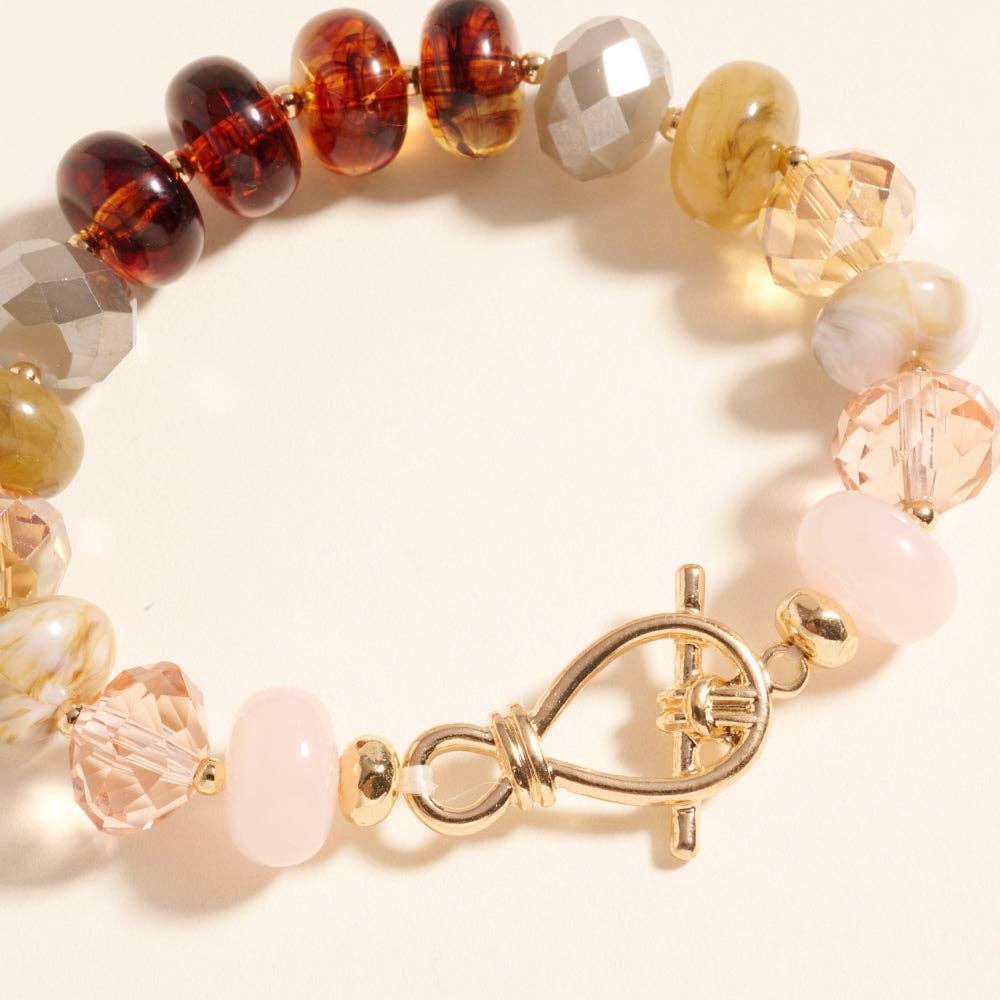 Pulsera elástica de cuentas ovaladas de resina marmoleada con efecto degradado