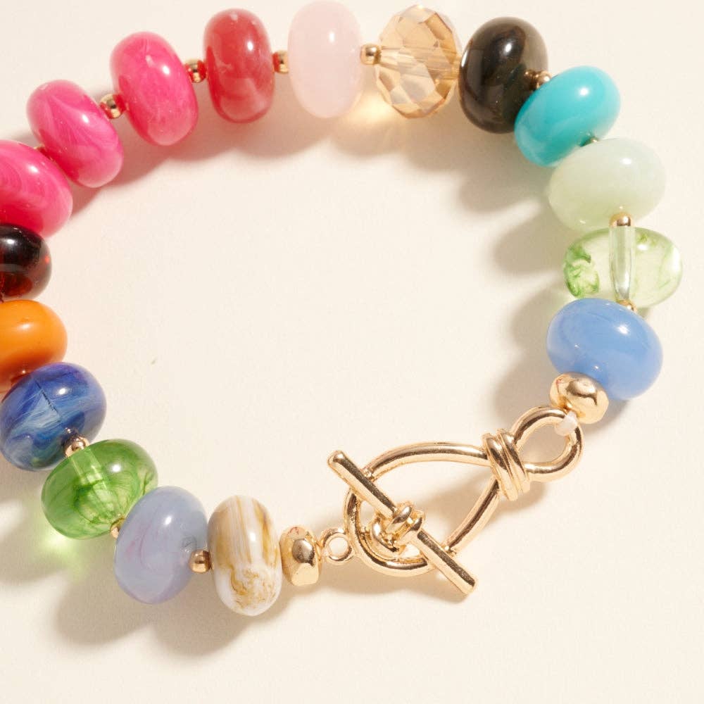 Pulsera elástica de cuentas ovaladas de resina marmoleada con efecto degradado
