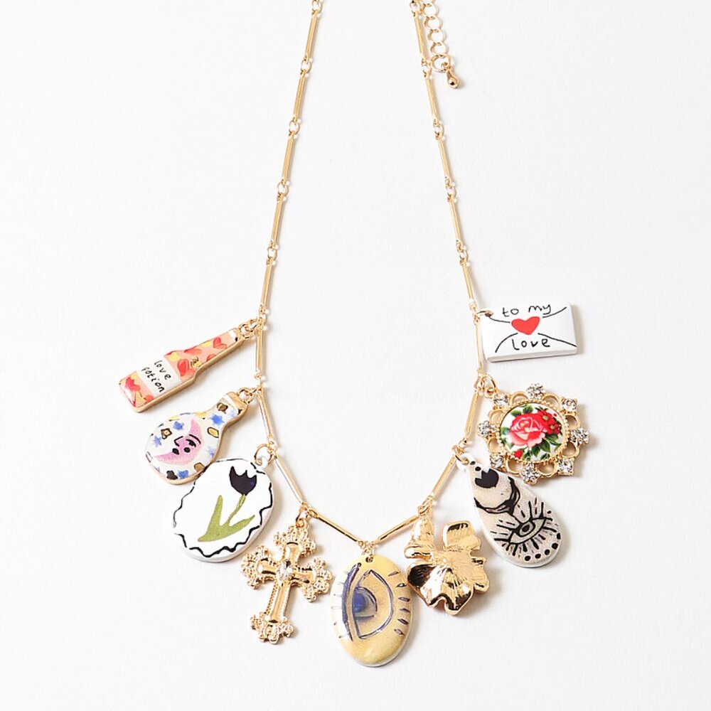 Collar con dije de "Protégeme y guíame"